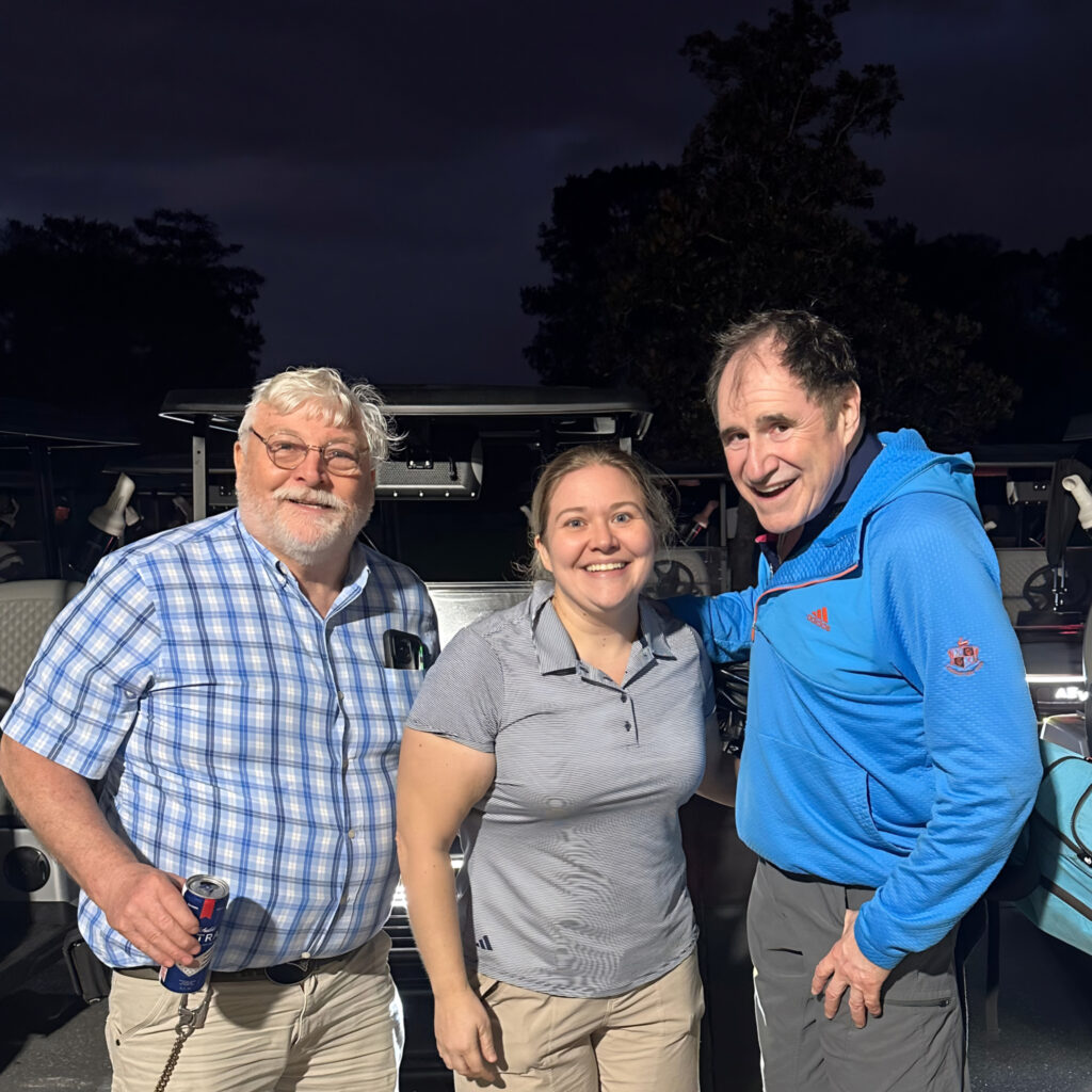 We finished our round in the dark and ran into Richard Kind at cart return — he was at Disney shooting a Lifetime Christmas movie that comes out later this year. My dad has a beer. Everyone is happy.